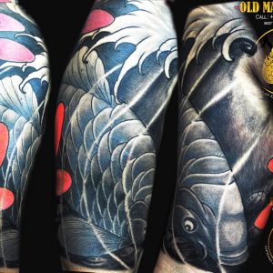 koi Fish half sleeve tattoo in phuket